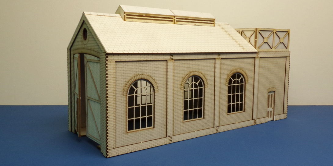 B 70-11 O gauge small engine shed with water tank Small engine shed with water tank. Based on B 70-01 and B 70-05. Full engine shed length is available for the engine. B 70-01E is compatible with this bundle.